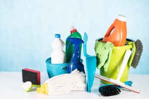 Colorful,Cleaning,Products,On,Blue,Background